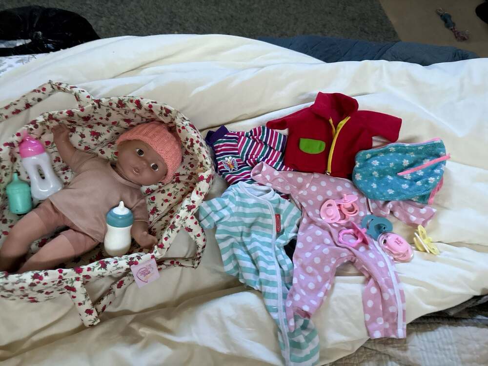 Baby Doll with Floral Carrier, Melissa & Doug Clothes, and Accessories Bundle